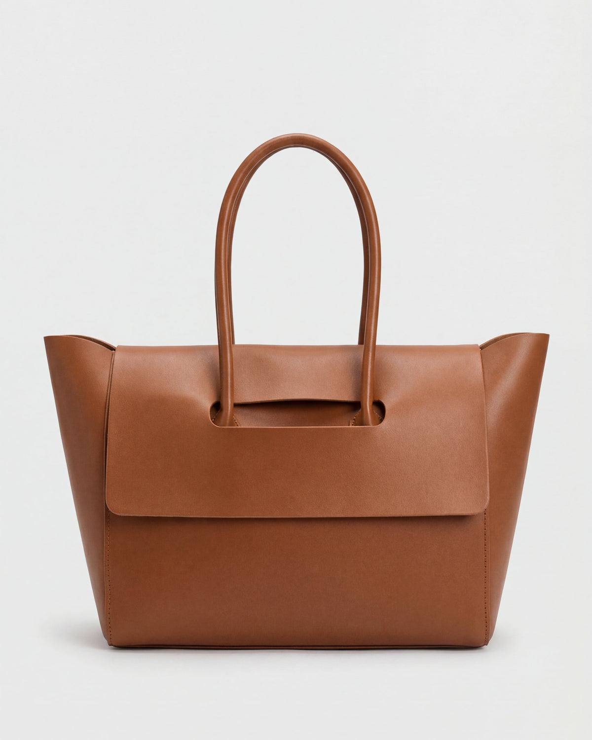 Elegant black Lumina Wear handbag with adjustable strap, featuring a sleek design and structured shape.