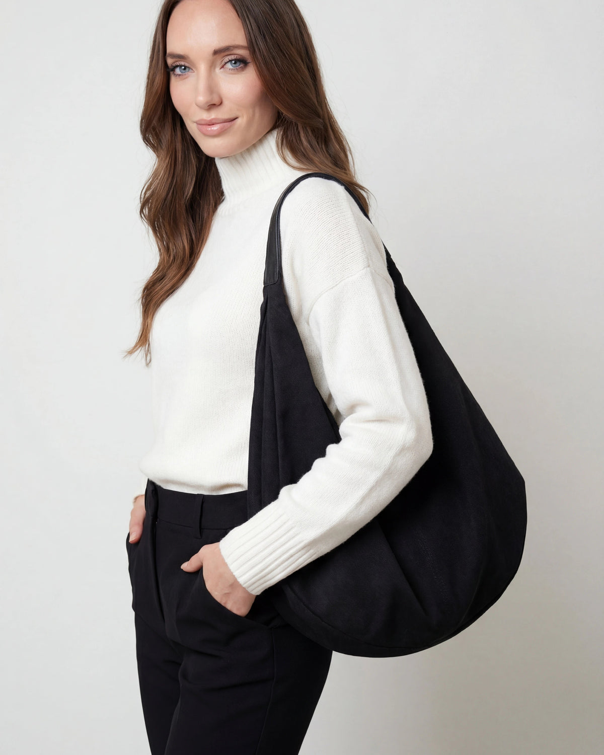 Lumina Wear Victoria black suede hobo handbag with multiple pockets, stylish and spacious for everyday use.