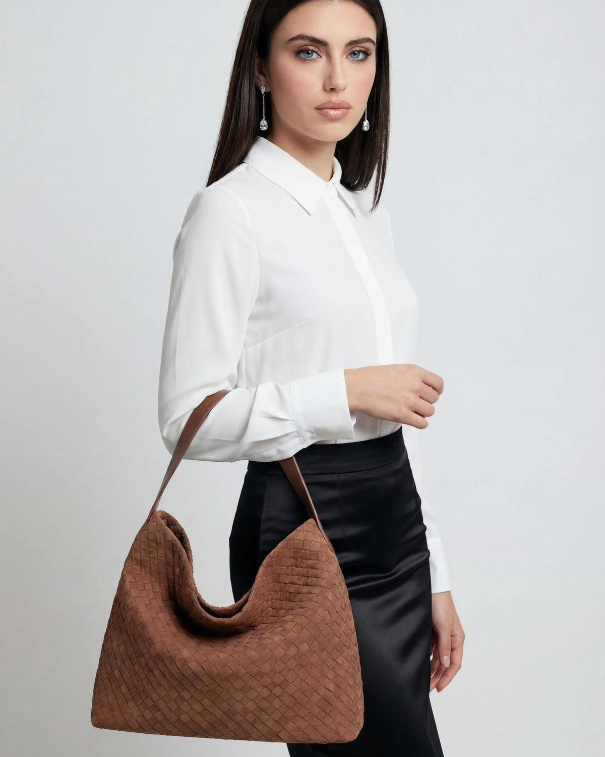 Lumina Wear Victoria black suede tote bag with a spacious design, perfect for everyday use and stylish accessories.