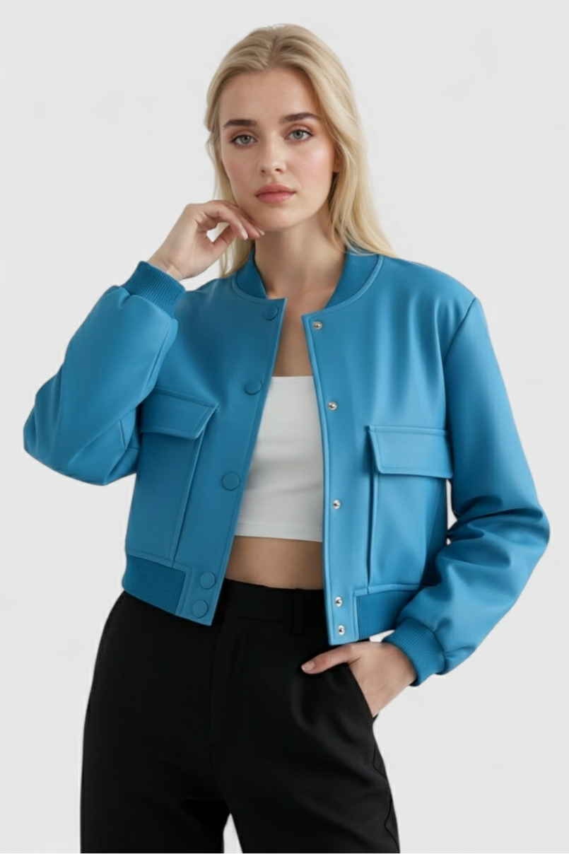 Elegant blue bomber jacket from Lumina Wear featuring a timeless design, shown on a model with stylish detailing.