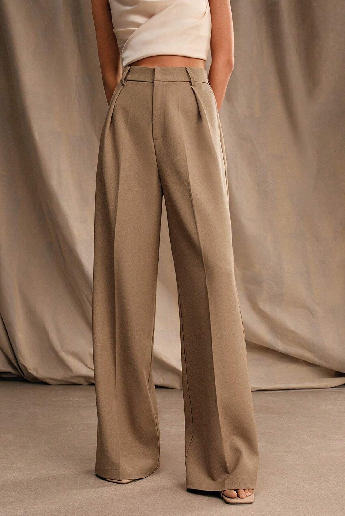Black Victoria Lumina Wear high waist wide leg trousers, stylish and elegant with a relaxed fit, perfect for modern fashion.