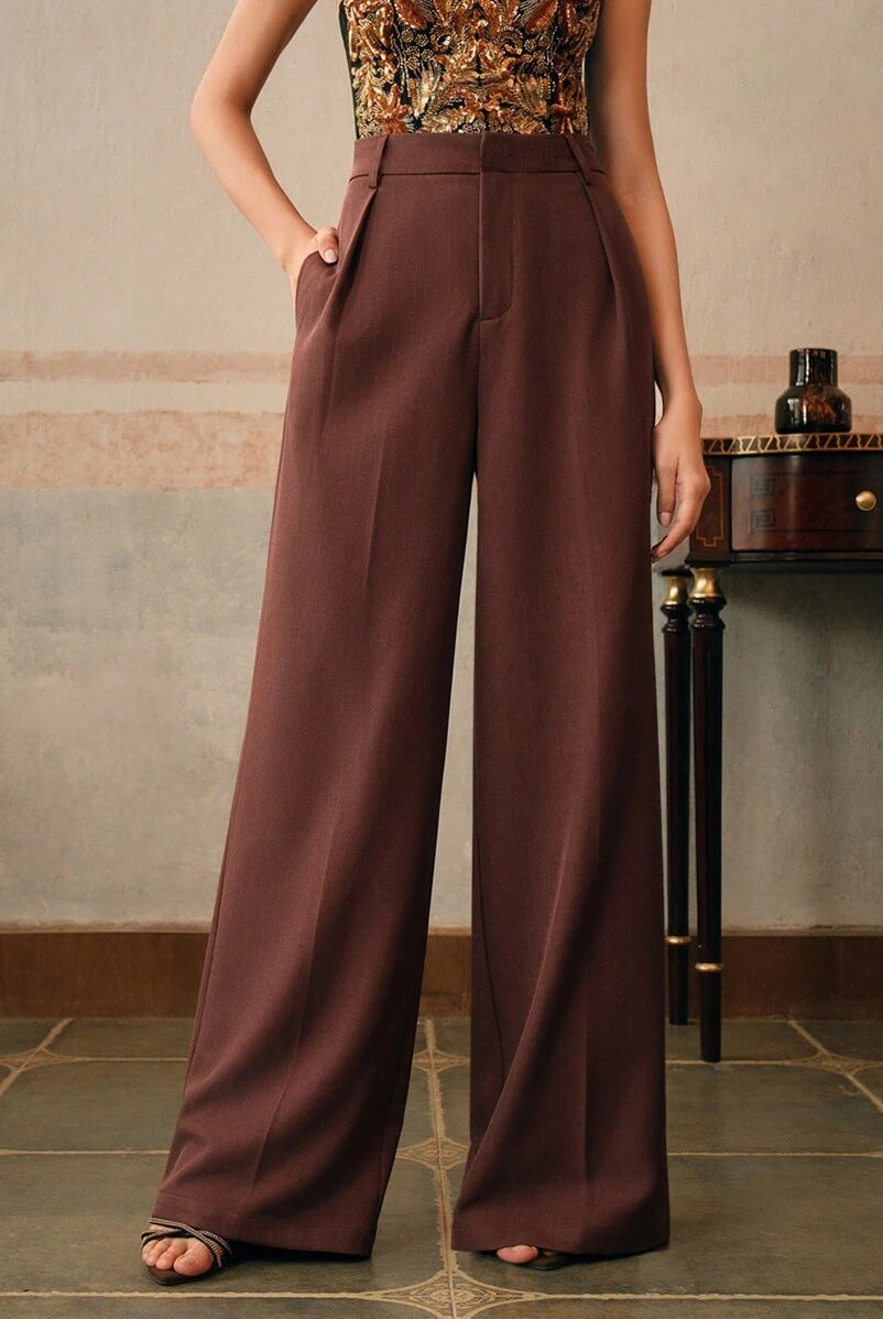Black Victoria Lumina Wear high waist wide leg trousers shown on a model featuring a stylish, elegant fit and flowy wide-leg design.