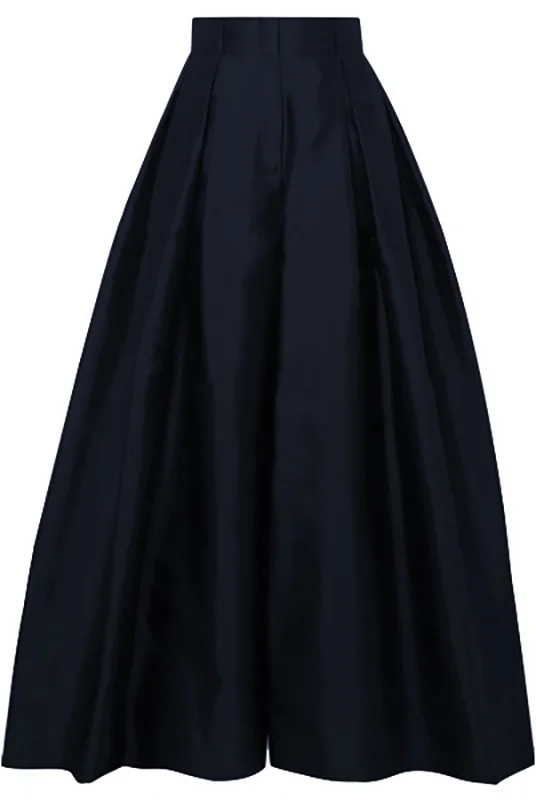 Victoria high-waisted pleated trousers by Lumina Wear in army green, showcasing tailored fit and elegant design.