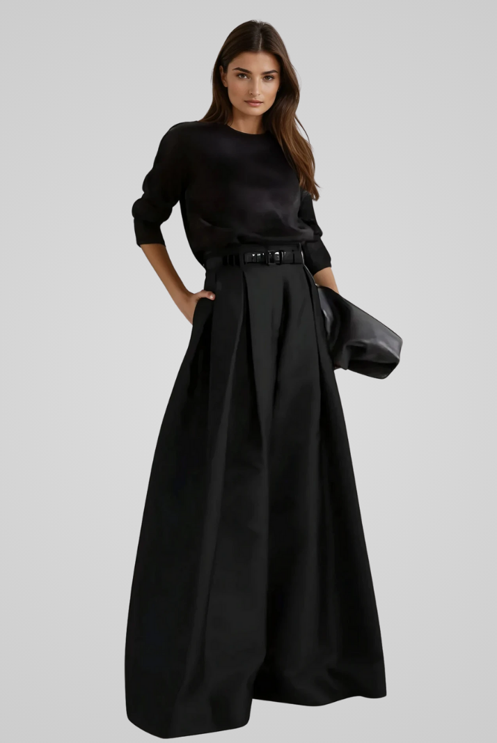 Black Victoria high-waisted trouser skirt with A-line cut by Lumina Wear, showcasing a sleek, elegant silhouette.