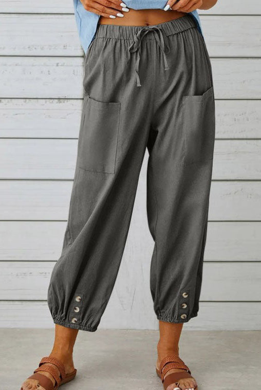 Victoria Lumina Wear elegant lightweight white wide-leg trousers, tailored fit with a flowing silhouette and comfortable fabric.