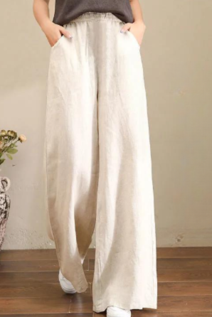 Black Victoria loose-fitting trousers by Lumina Wear featuring an elegant, chic design and comfortable fit.