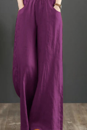 Black Victoria loose-fitting trousers by Lumina Wear featuring a chic, elegant design and relaxed fit.