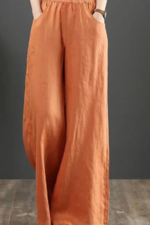 Black Victoria loose-fitting trousers by Lumina Wear featuring an elegant, chic design and relaxed fit for stylish comfort.