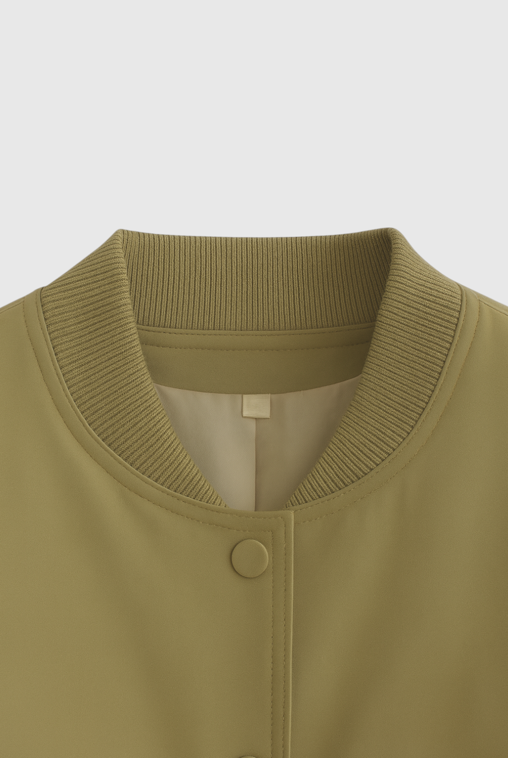 Olive green Lumina Wear Victoria bomber jacket with elegant, timeless design, displayed on a mannequin.