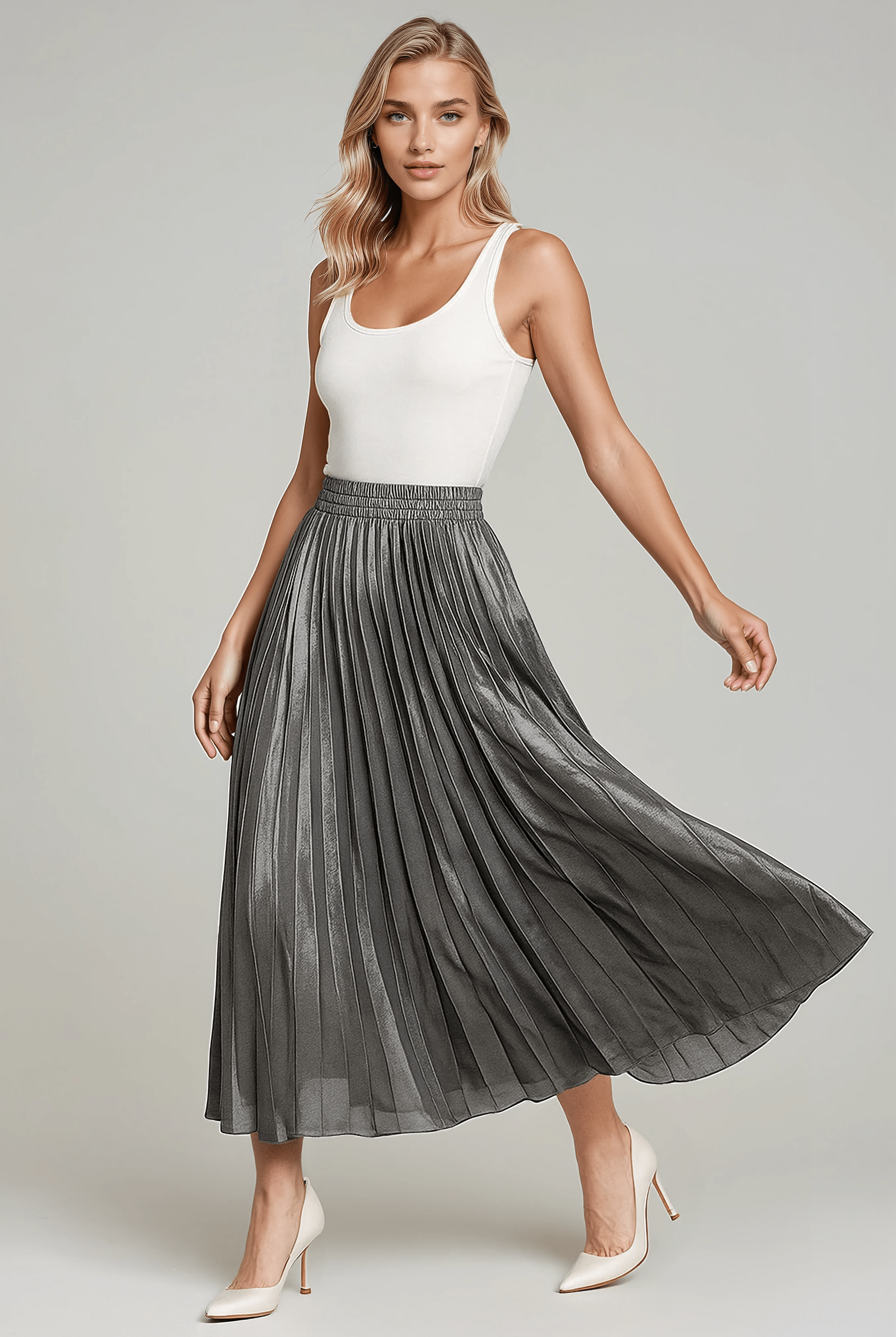 Gold pleated maxi skirt for women from Lumina Wear, featuring elegant flowy fabric and a stylish design.