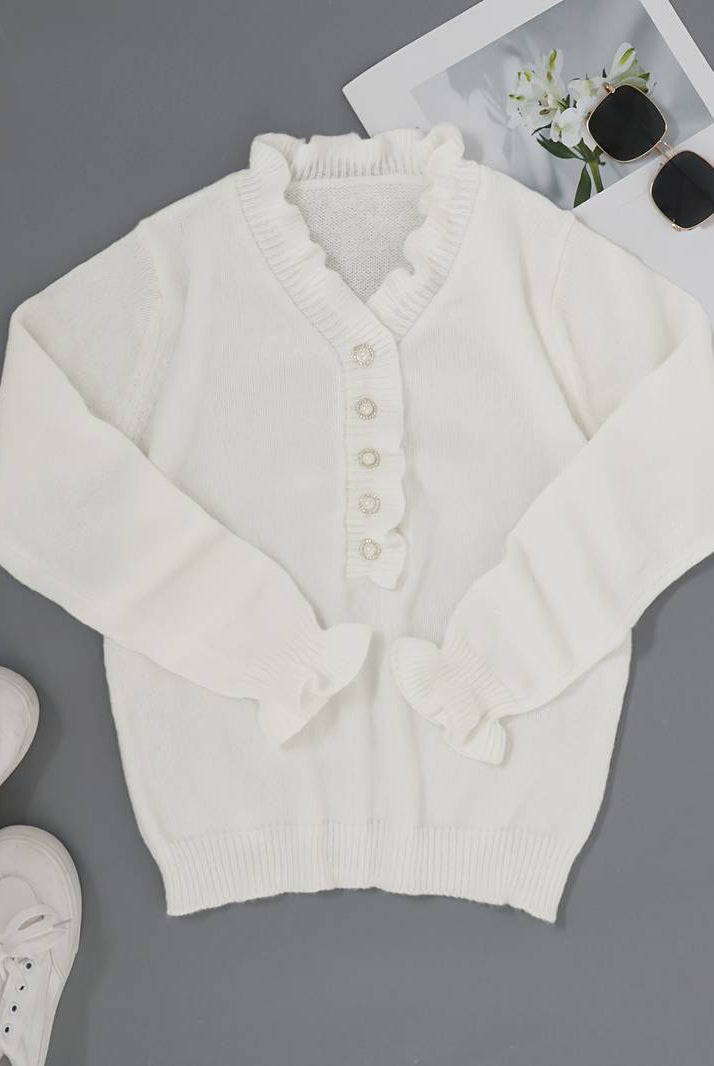 Lumina Wear Victoria women's blouse with elegant ruffle design and decorative buttons, featuring a stylish and feminine look.