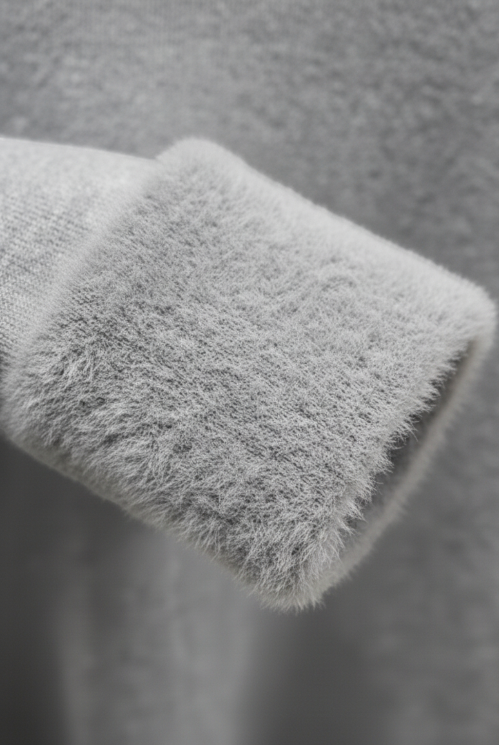 Lumina Wear Victoria gray slim fit turtleneck sweater with velvety texture, showcasing a stylish and cozy knit design.