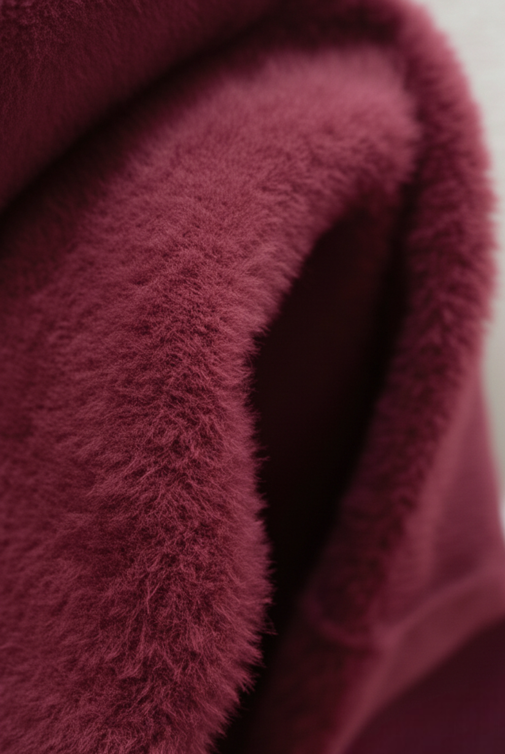 Lumina Wear Victoria burgundy slim fit turtleneck sweater, elegant knit sweater for women, close-up of the cozy, stylish garment.