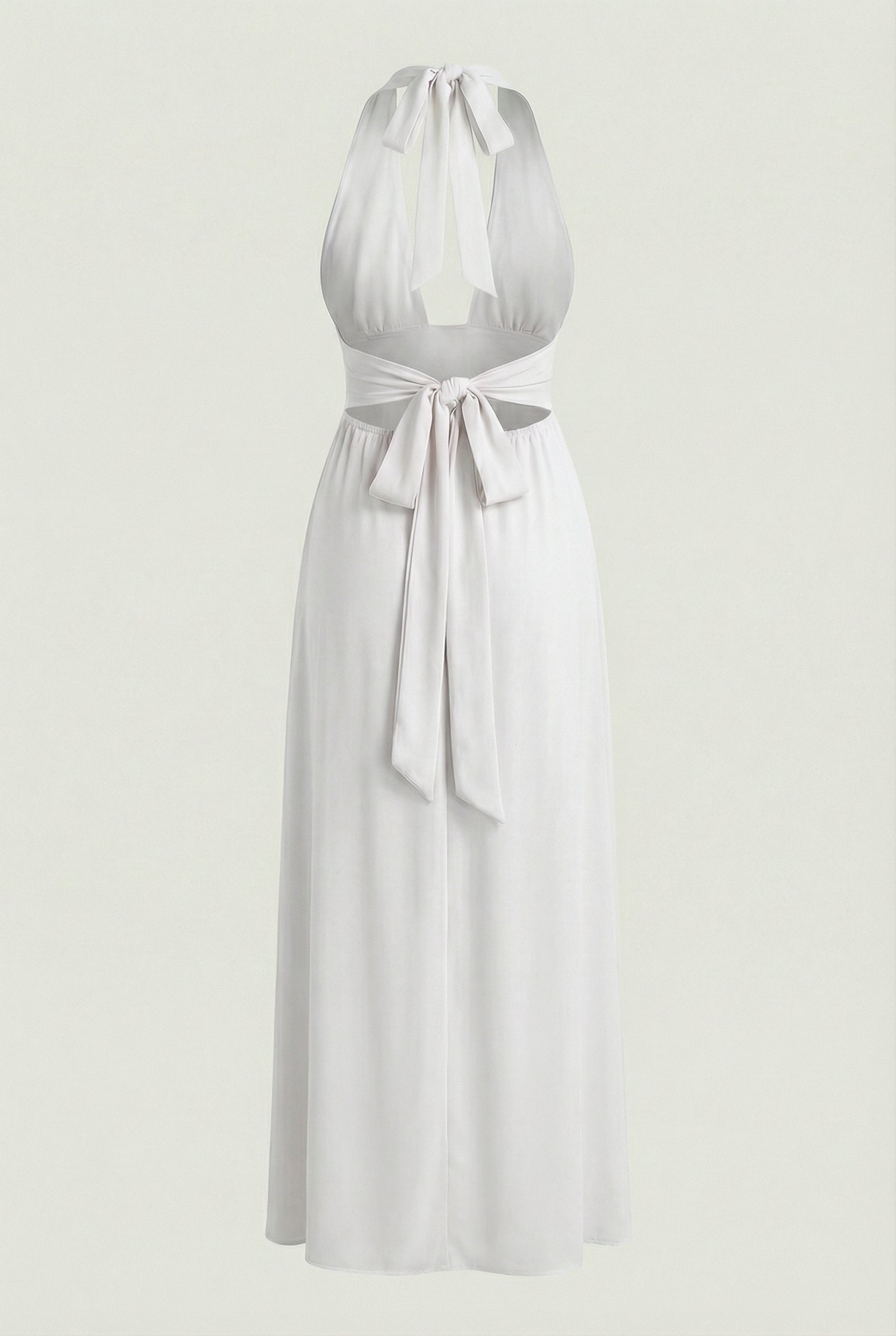 Elegant white backless summer dress by Lumina Wear featuring a flattering silhouette, perfect for warm-weather occasions.