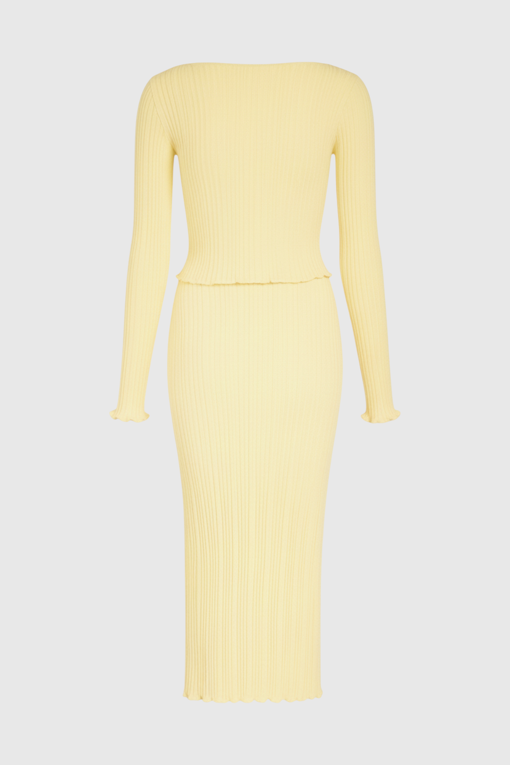 Elegant yellow knitted maxi skirt set with slim fit from Lumina Wear, featuring a stylish, coordinated skirt and top ensemble.