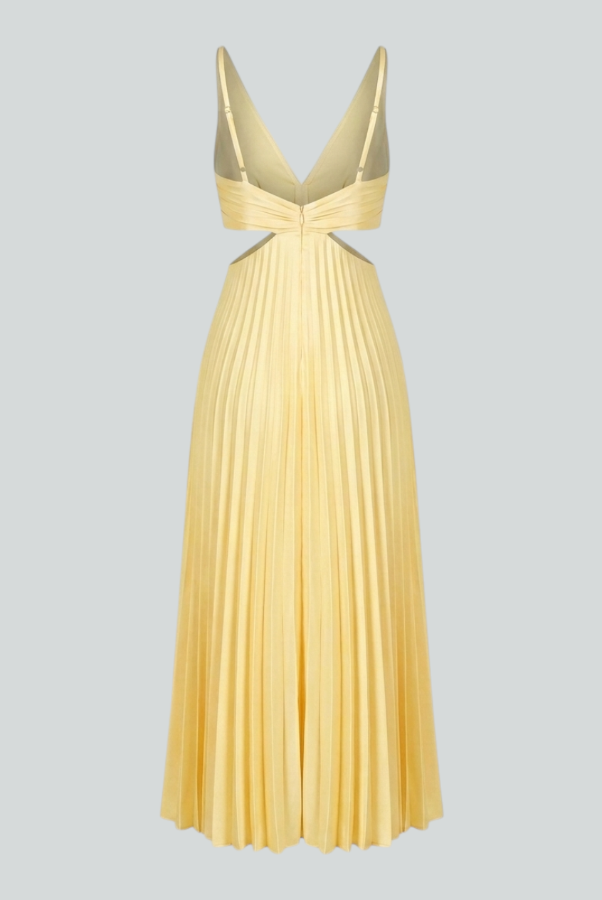 Yellow pleated dress by Lumina Wear featuring a flowing silhouette and elegant design, perfect for women’s fashion.