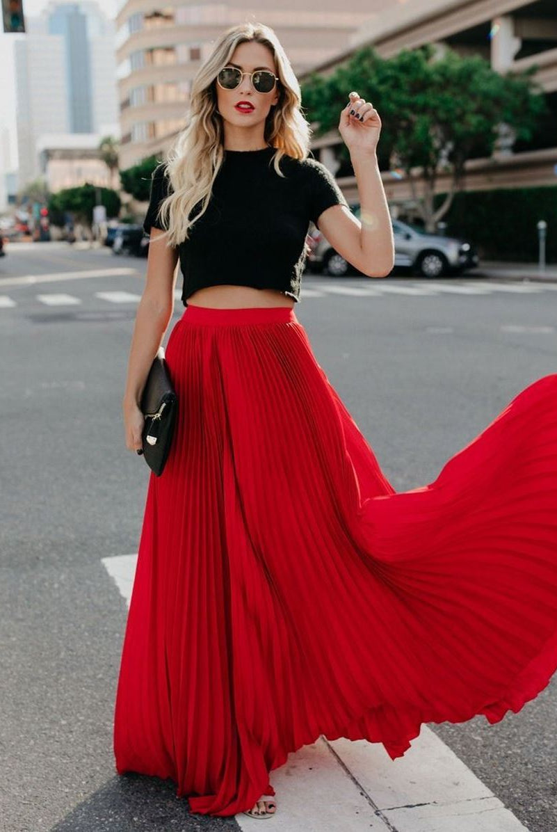 Flowy brown high-waist maxi skirt from Lumina Wear, featuring a flowing silhouette and elegant design.