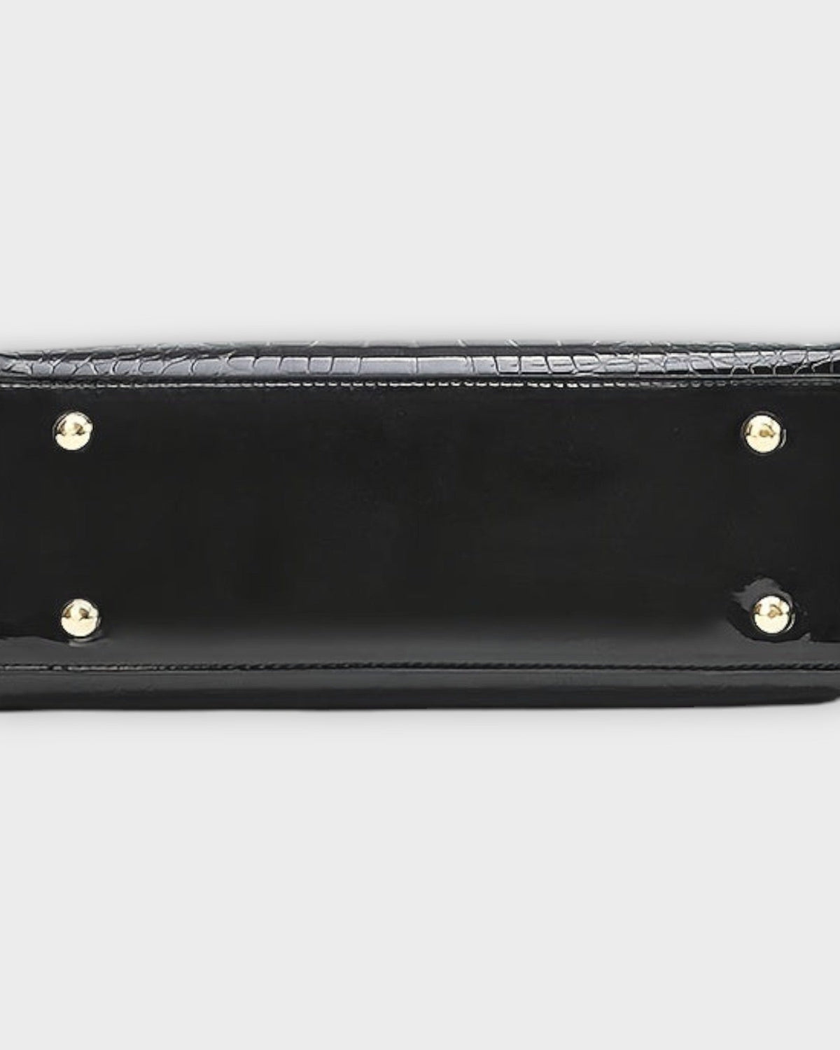 Black glossy crocodile pattern handbag with structured design from Lumina Wear Victoria collection.