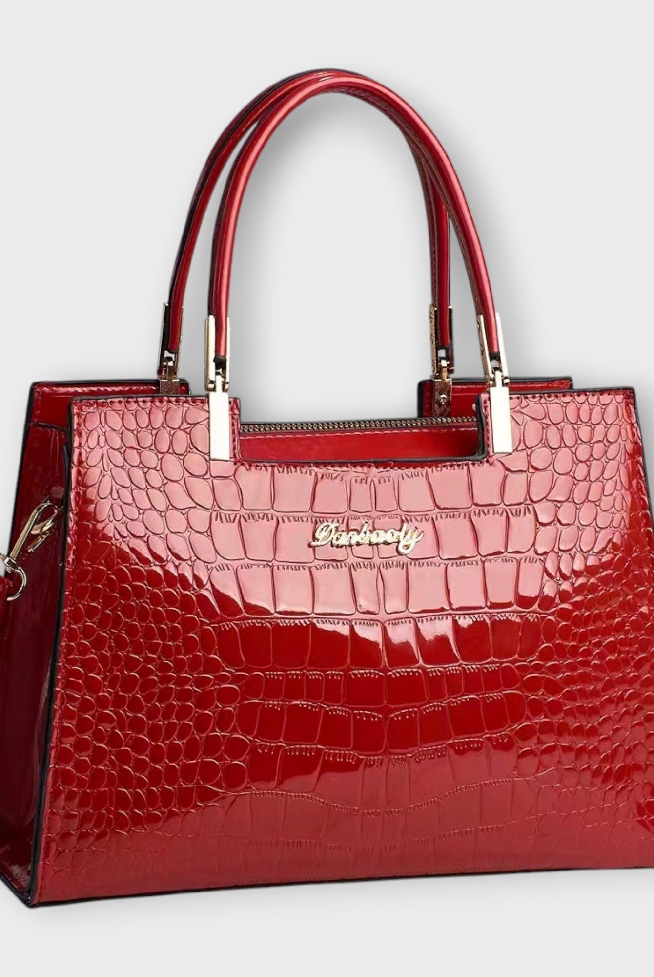 Black Victoria Lumina glossy crocodile pattern handbag with structured design, featuring a sleek and elegant look.