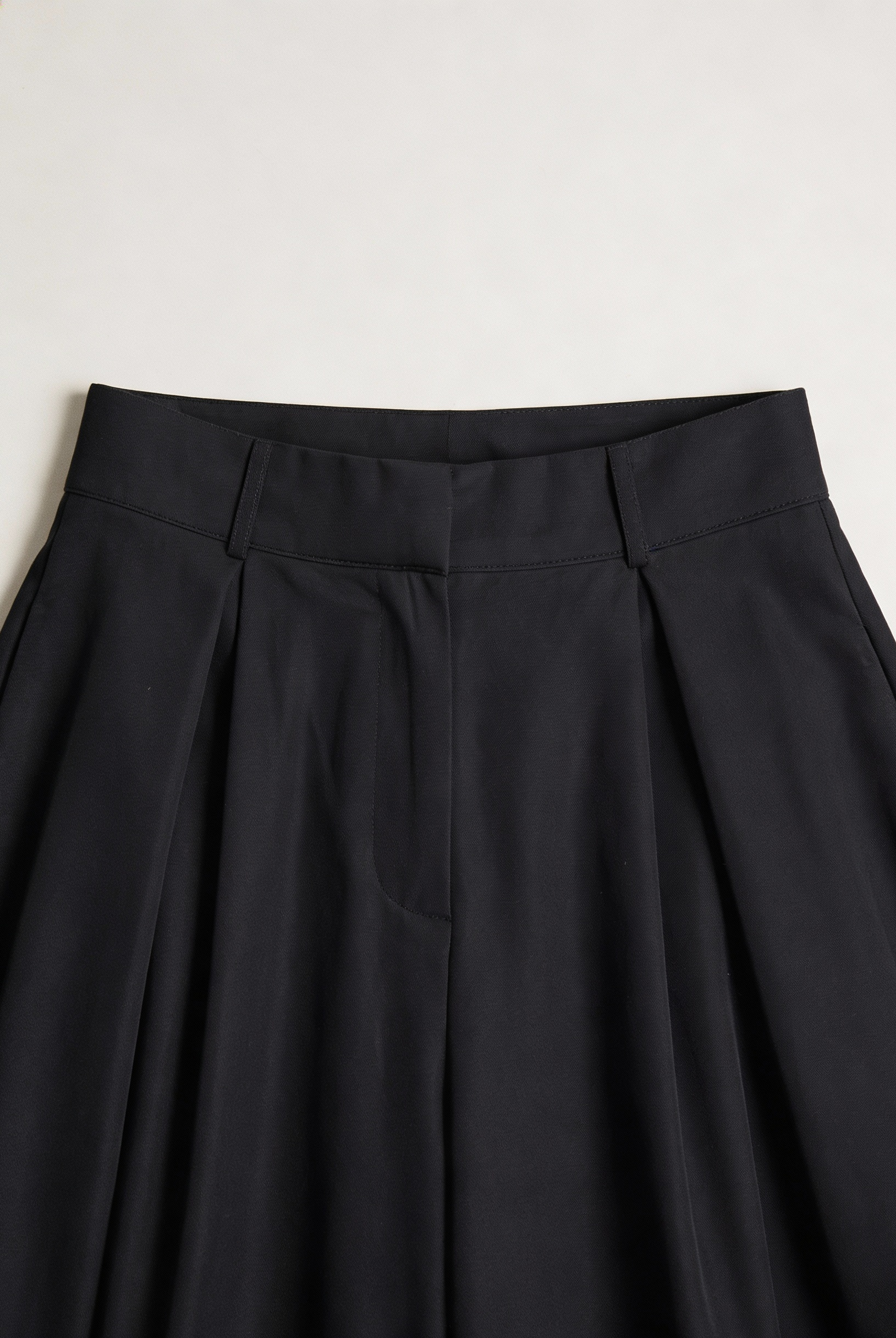 Black Victoria high-waisted wide-leg trousers by Lumina Wear, featuring an elegant fit and stylish design.