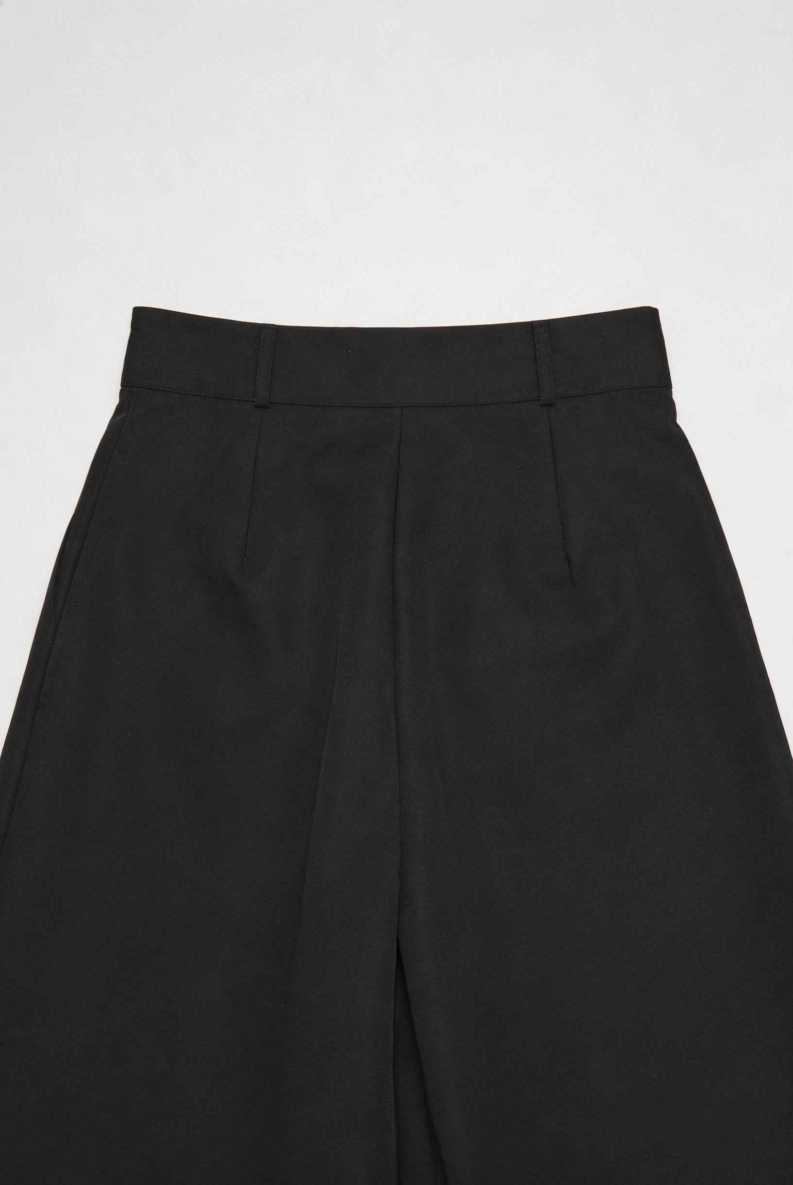 Black Victoria high-waisted wide-leg trousers by Lumina Wear, featuring an elegant fit and flowing silhouette.