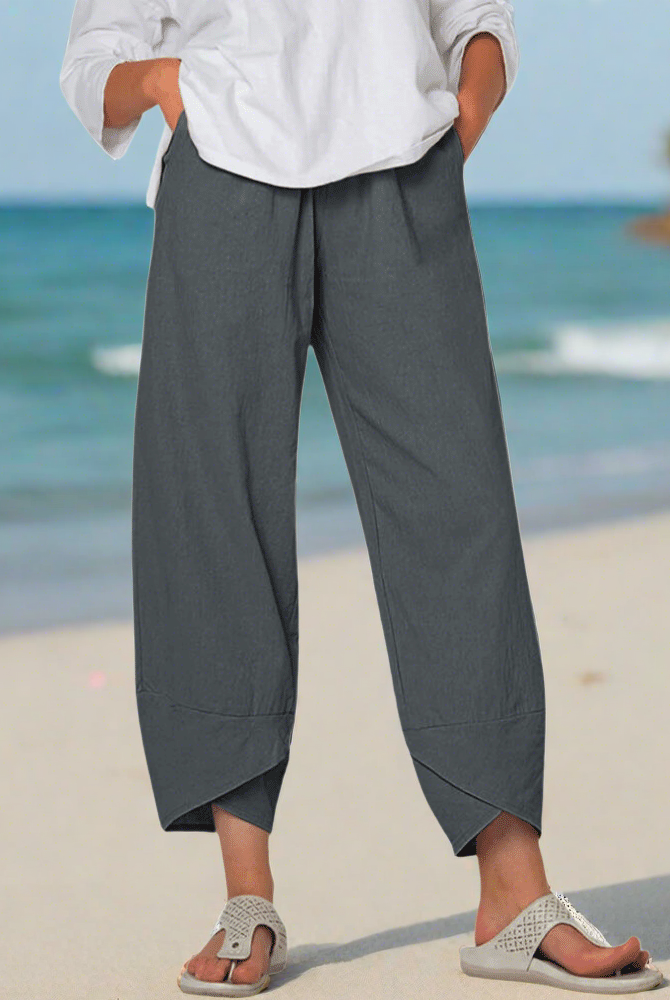 Victoria Lumina Wear lightweight relaxed fit white casual trousers displayed on model, showcasing comfortable, versatile pants.