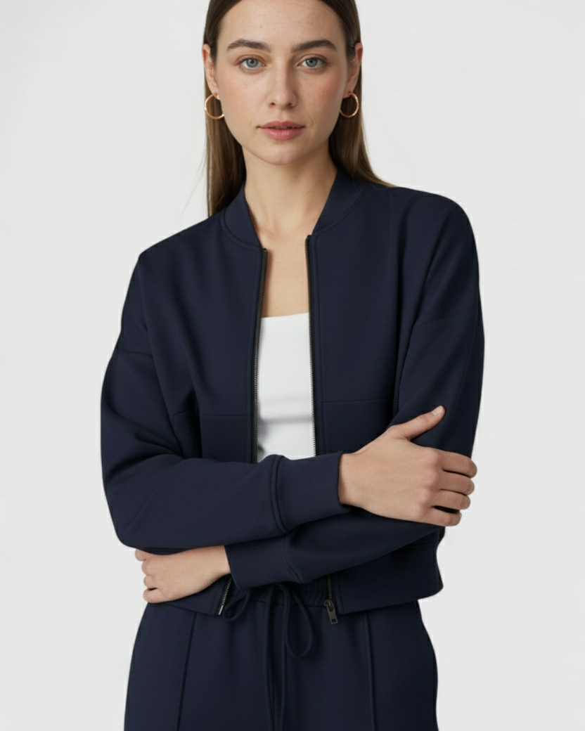 Victoria Lumina Wear relaxed fit dark blue sweatpants and sweatshirt set with zipper accents, casual activewear ensemble.