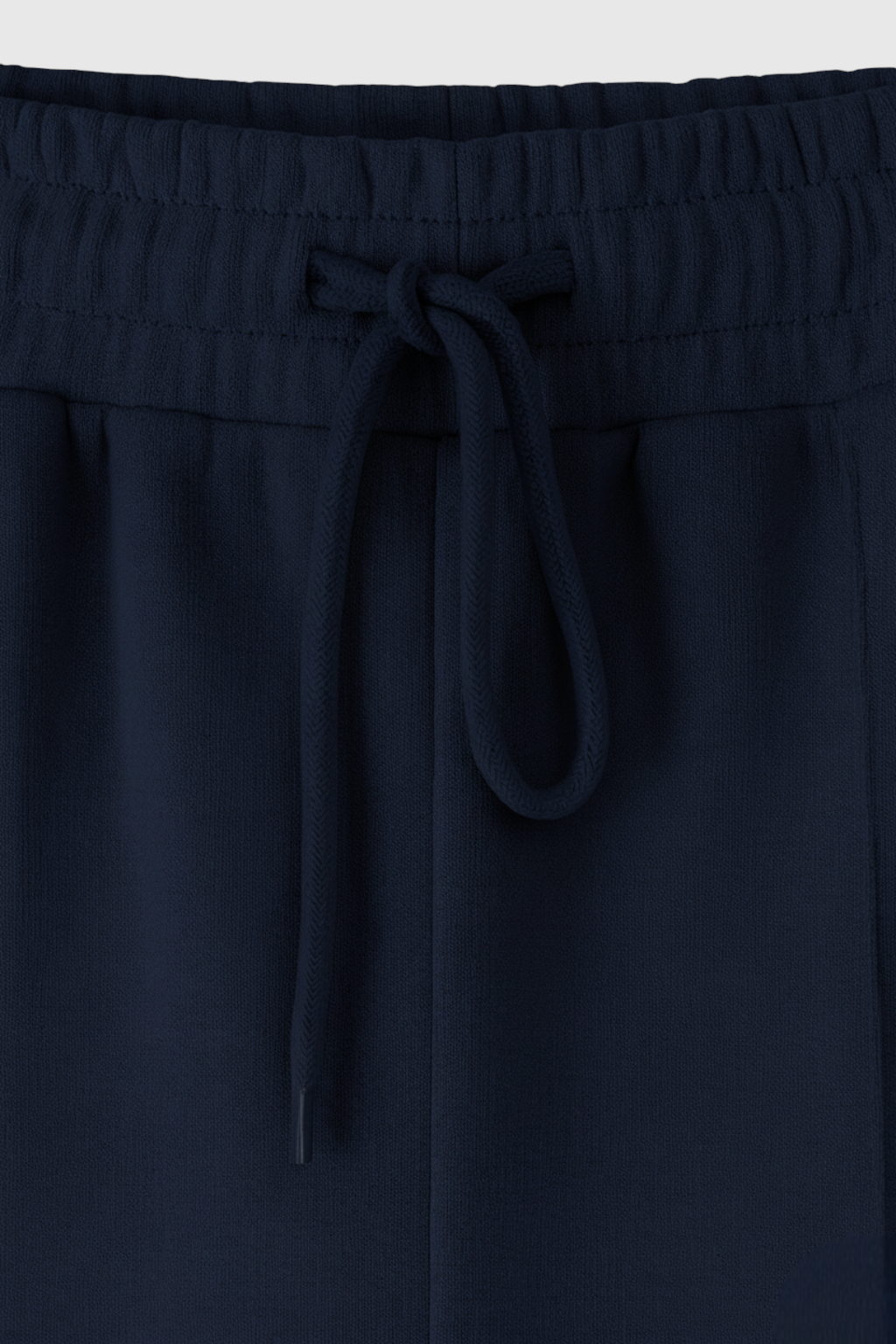 Victoria Lumina activewear set with relaxed fit dark blue sweatpants and sweatshirt featuring zipper accents, ideal for casual wear.