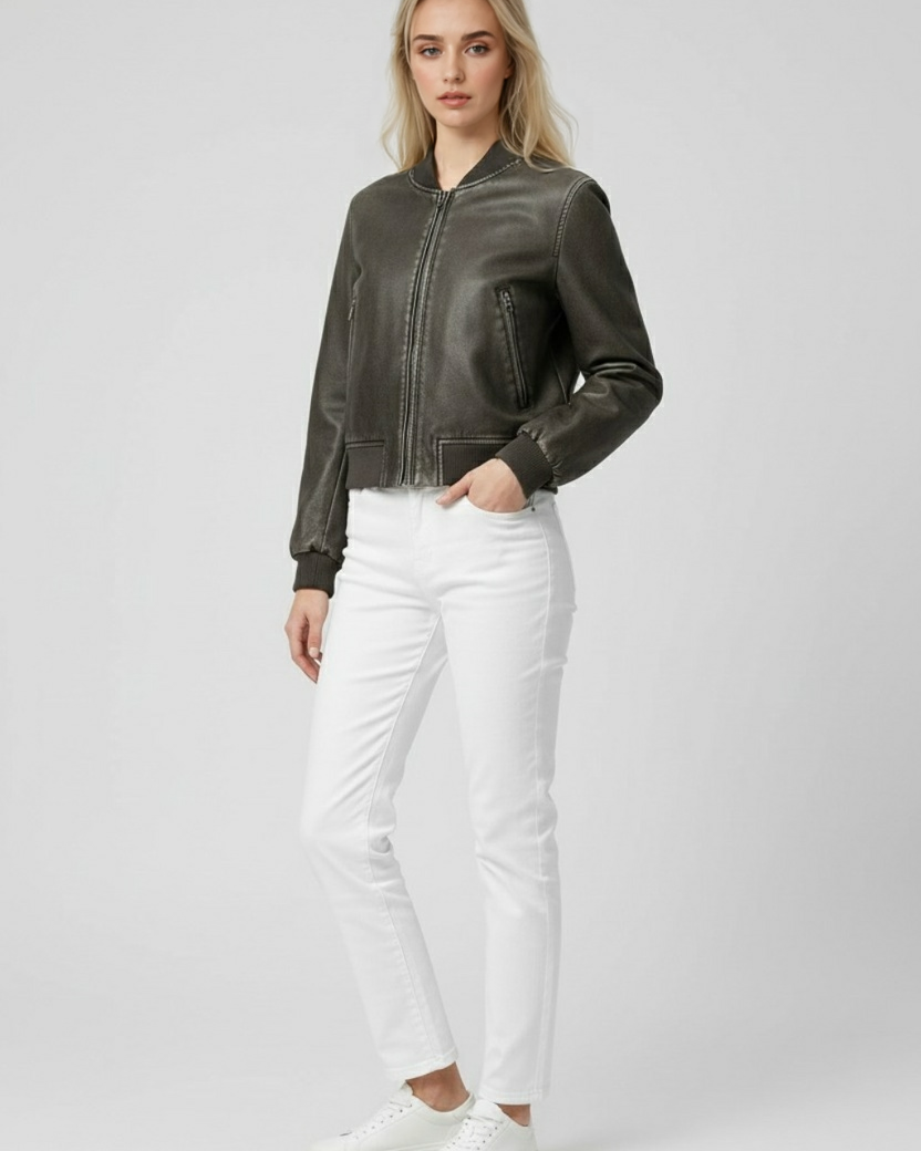 Black Victoria bomber jacket by Lumina Wear featuring retro-inspired design and modern comfort, shown on a hanger.