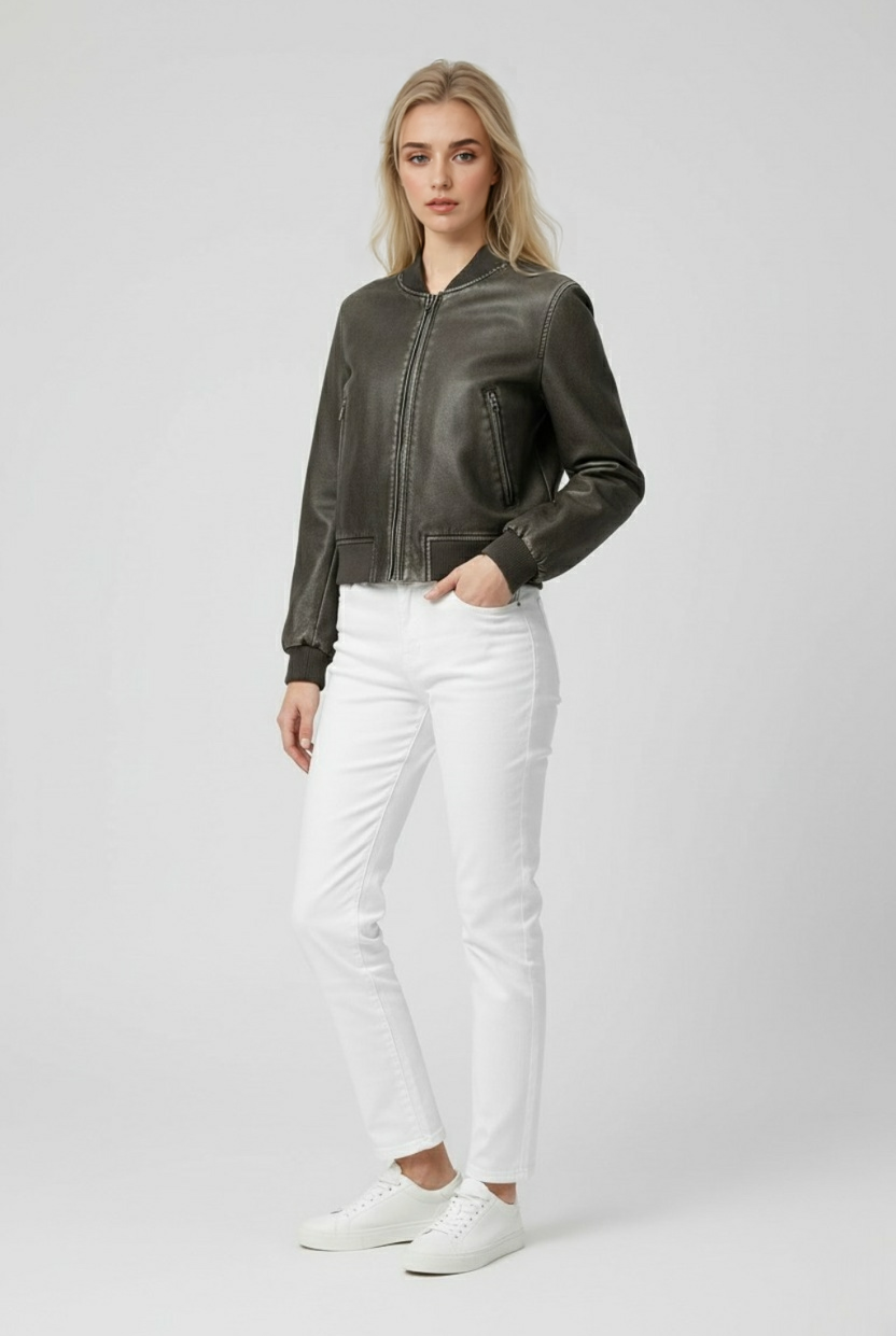 Victoria Lumina black retro-inspired bomber jacket with modern comfort, shown on a model with a casual urban background.