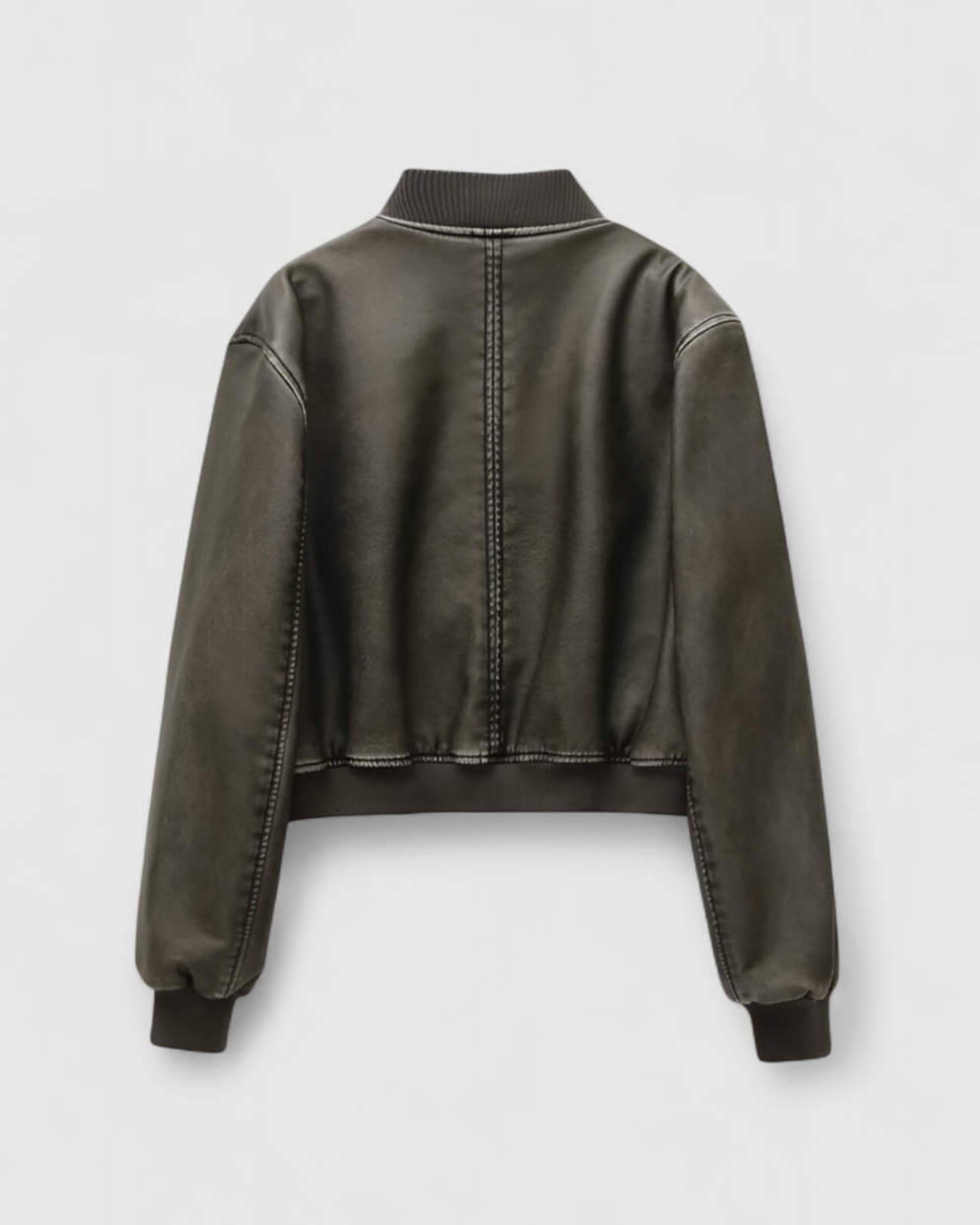 Black Victoria bomber jacket by Lumina Wear featuring retro-inspired design and modern comfort, displayed on a hanger.