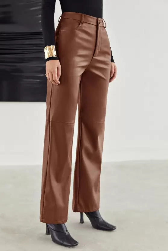 Victoria Lumina black leather slim fit trousers for women with soft finish, shown on a model.