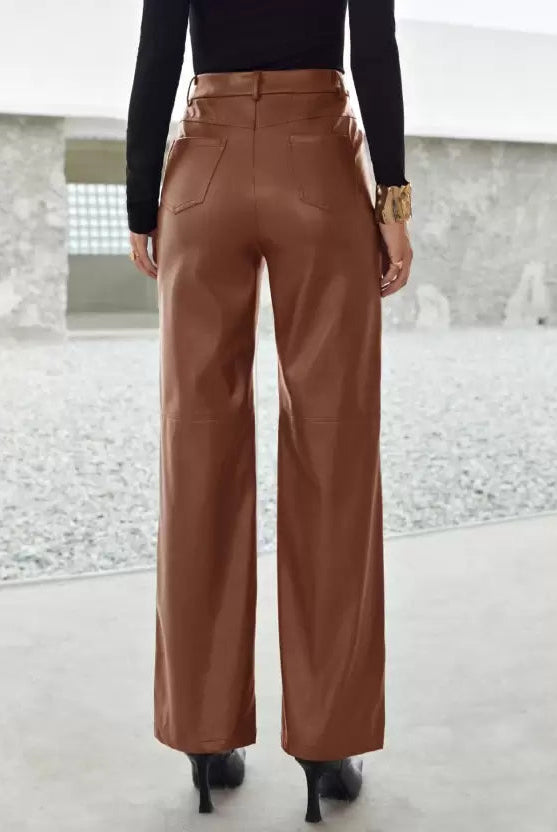 Victoria Lumina slim fit black leather trousers for women with soft finish, showcasing a sleek, tailored look and soft leather texture.