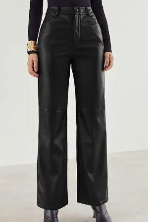 Victoria Lumina slim fit black leather trousers for women with soft finish, shown on a model.