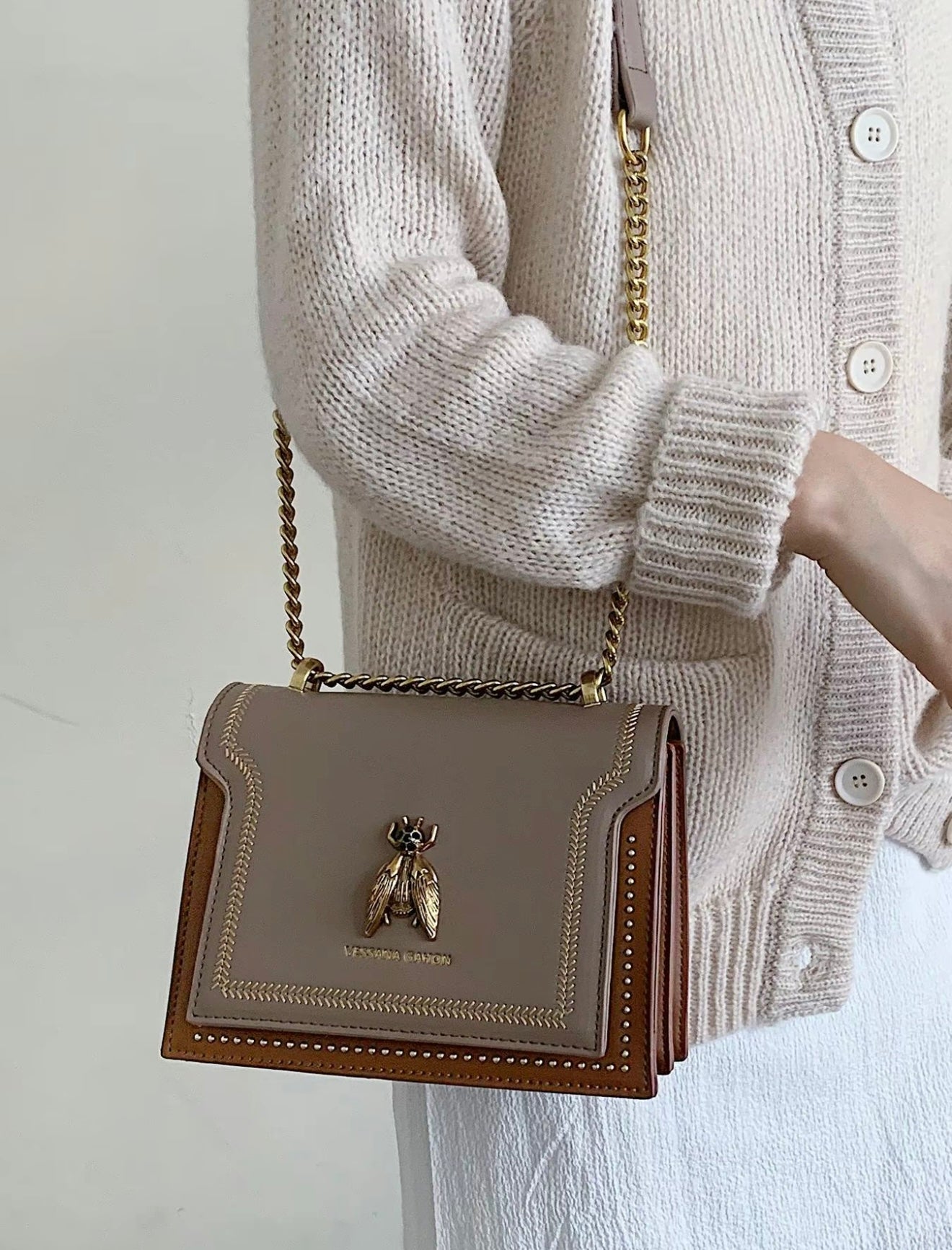Lumina Wear Victoria structured chain bag in khaki with elegant design and chic detailing, perfect for stylish handbags.