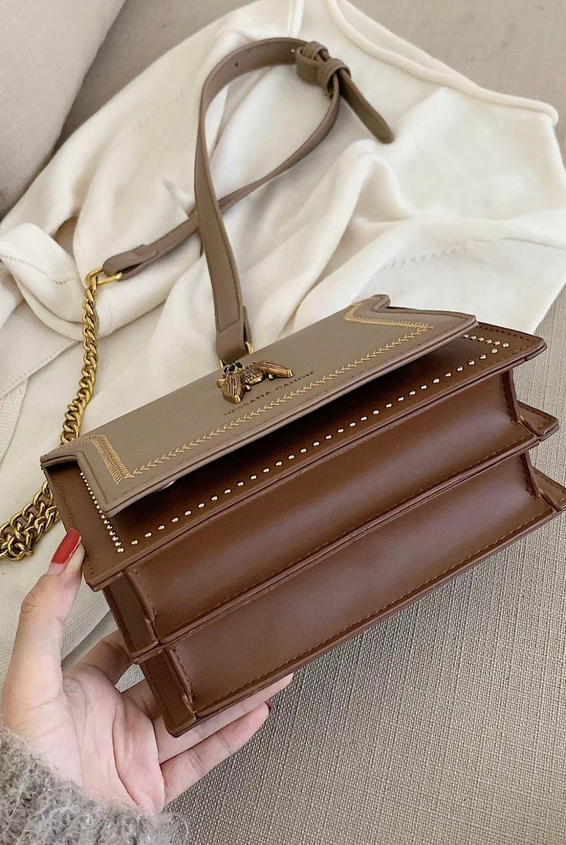 Lumina Wear Victoria structured chain bag in khaki with elegant detailing and chic accents, perfect for stylish occasions.