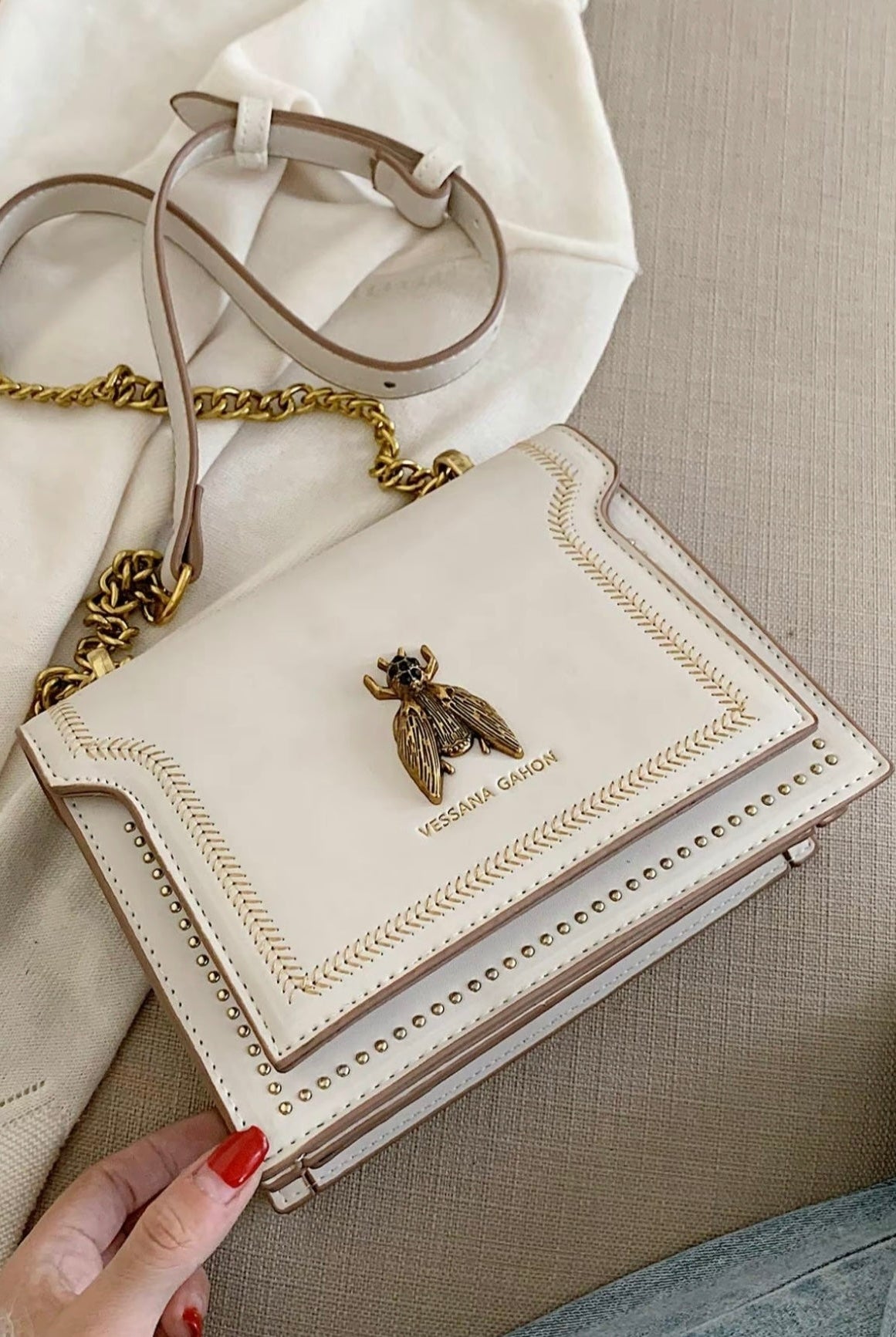 Khaki Victoria Lumina structured chain handbag with elegant detailing, showcasing a chic and sophisticated design.