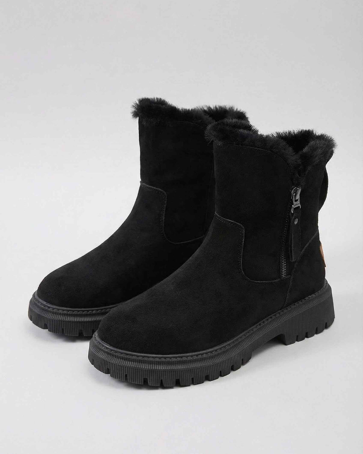 Victoria black waterproof winter boots for women by Lumina Wear, featuring durable material and cozy lining for cold weather.