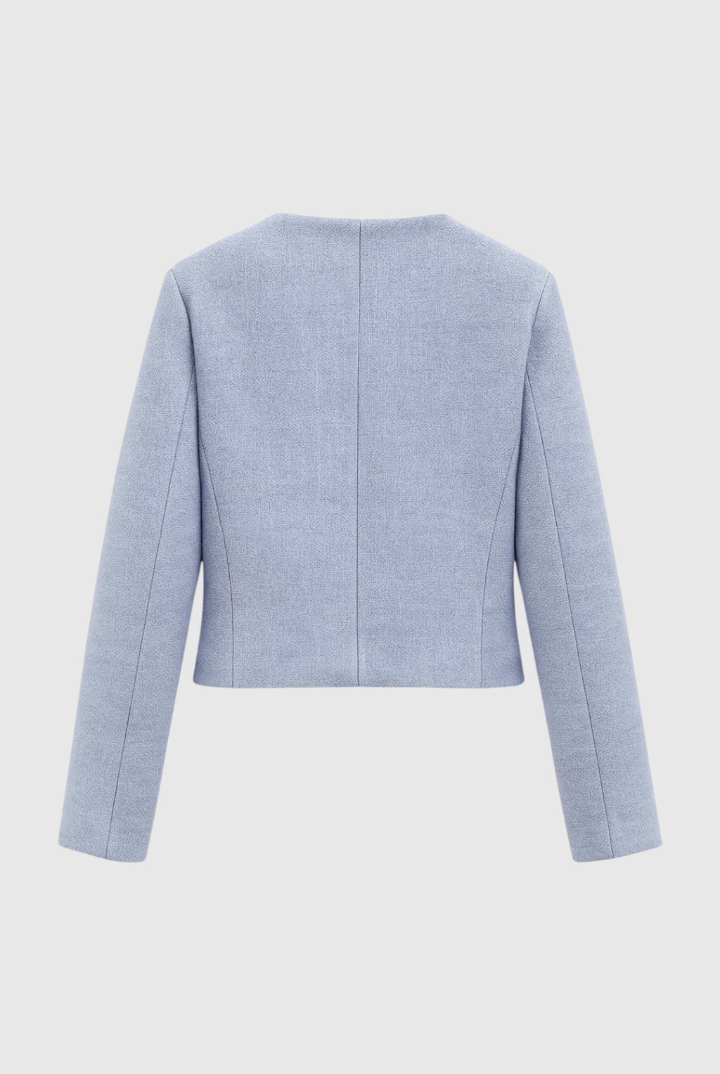 Light blue women's short jacket by Lumina Wear, stylish and versatile design perfect for casual or semi-formal outfits.