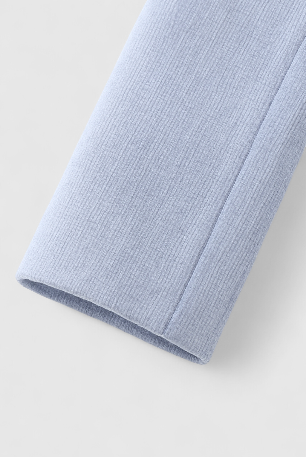Light blue Victoria women's short jacket by Lumina Wear, featuring a stylish, versatile design for casual and layered looks.