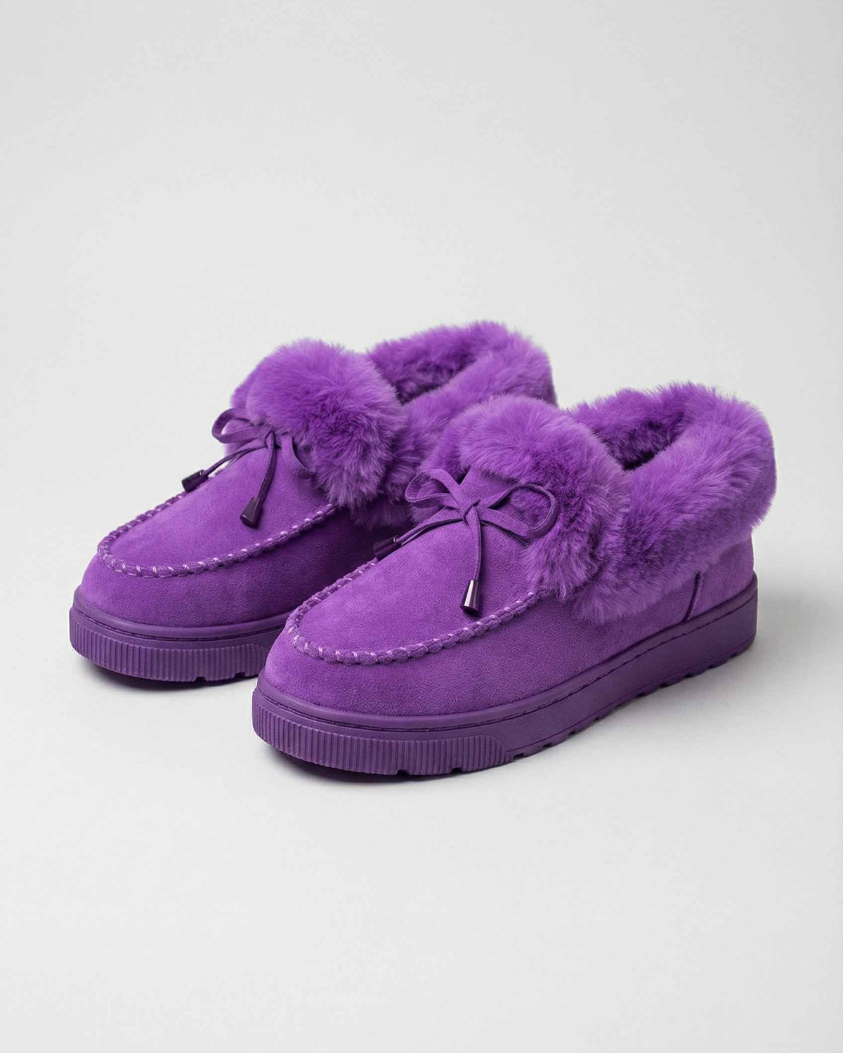 Lumina Wear Victoria purple winter boots with a stylish design and comfortable fit, featuring a cozy interior and sturdy sole.