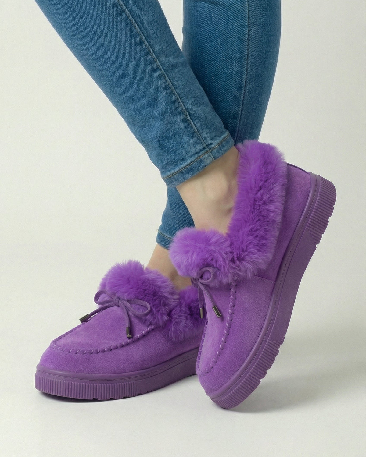 Victoria Lumina Wear purple winter boots featuring a stylish design, comfortable fit, and sturdy sole for cold weather wear.
