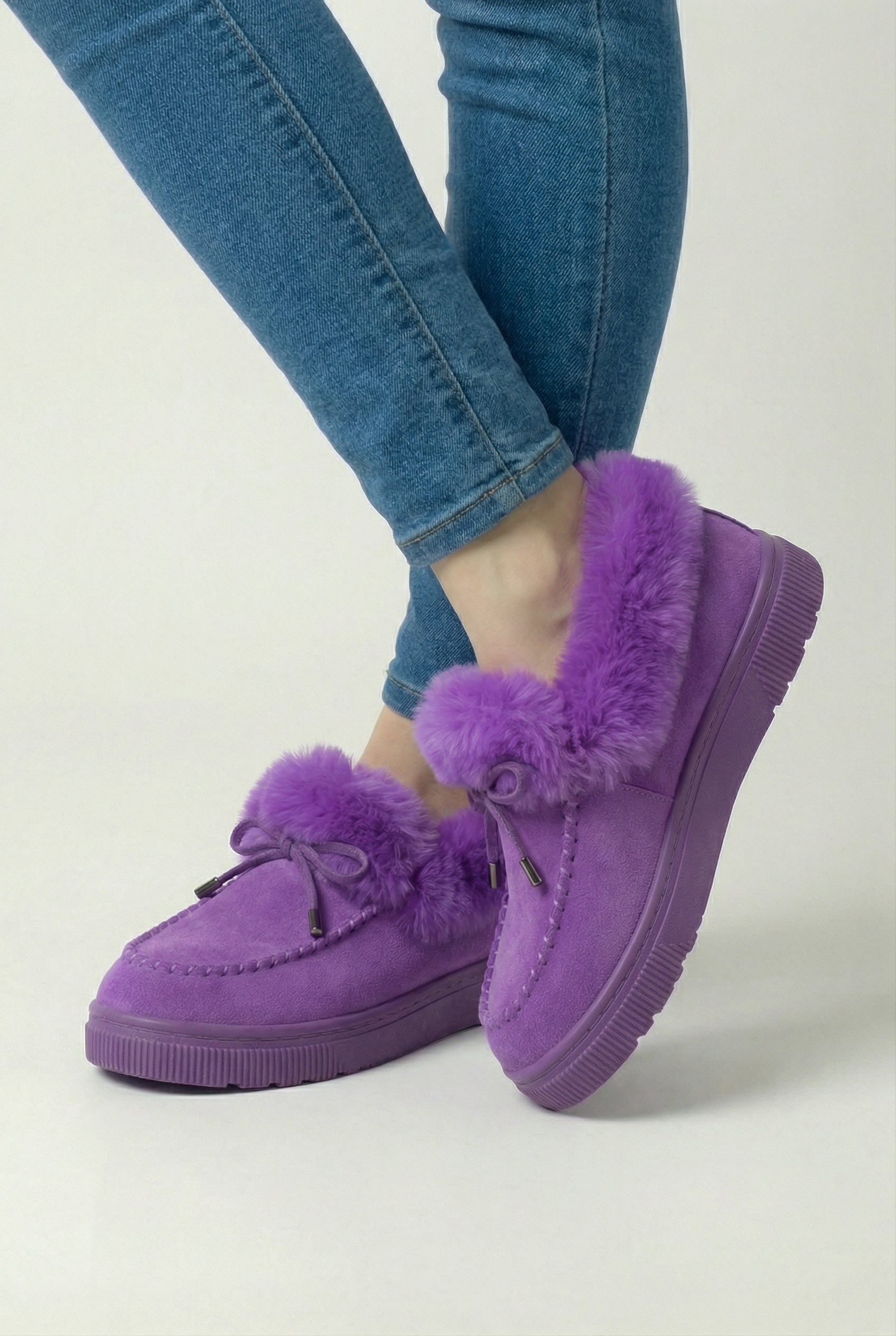 Victoria Lumina Wear purple winter boots featuring a stylish design, comfortable fit, and sturdy sole for cold weather wear.
