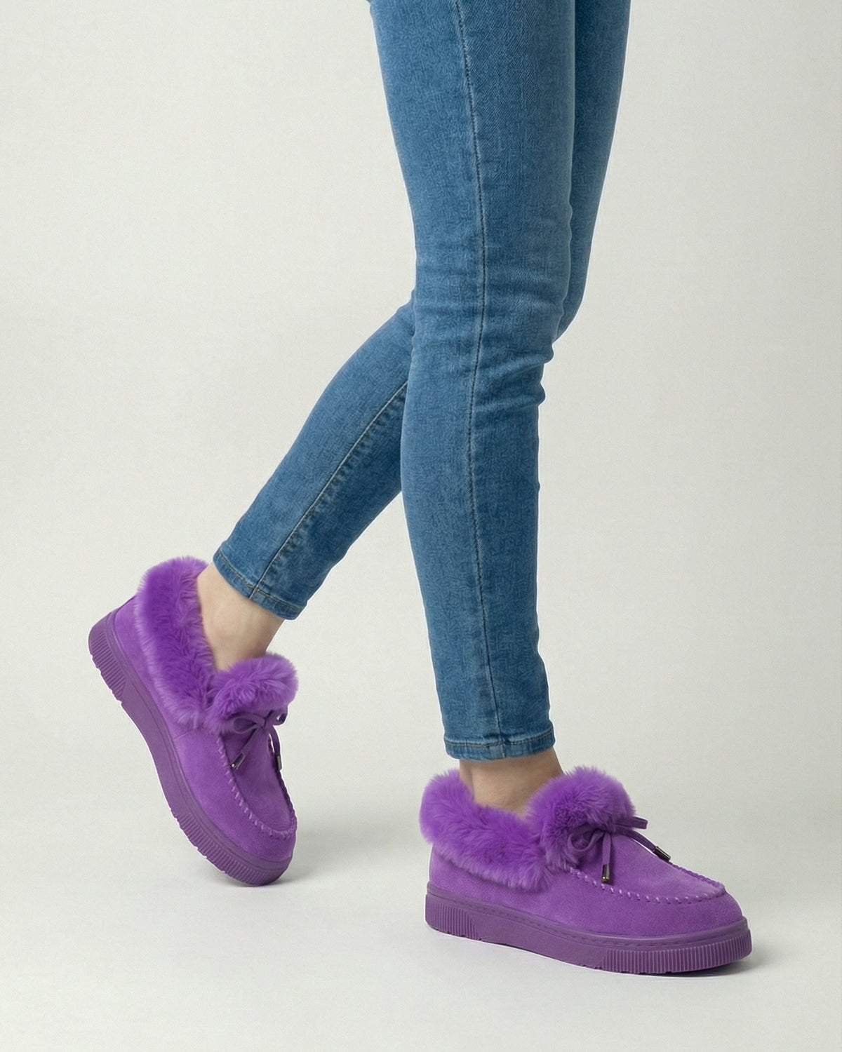 Victoria Lumina Wear stylish purple winter boots with comfortable fit, featuring a cozy design and durable sole.