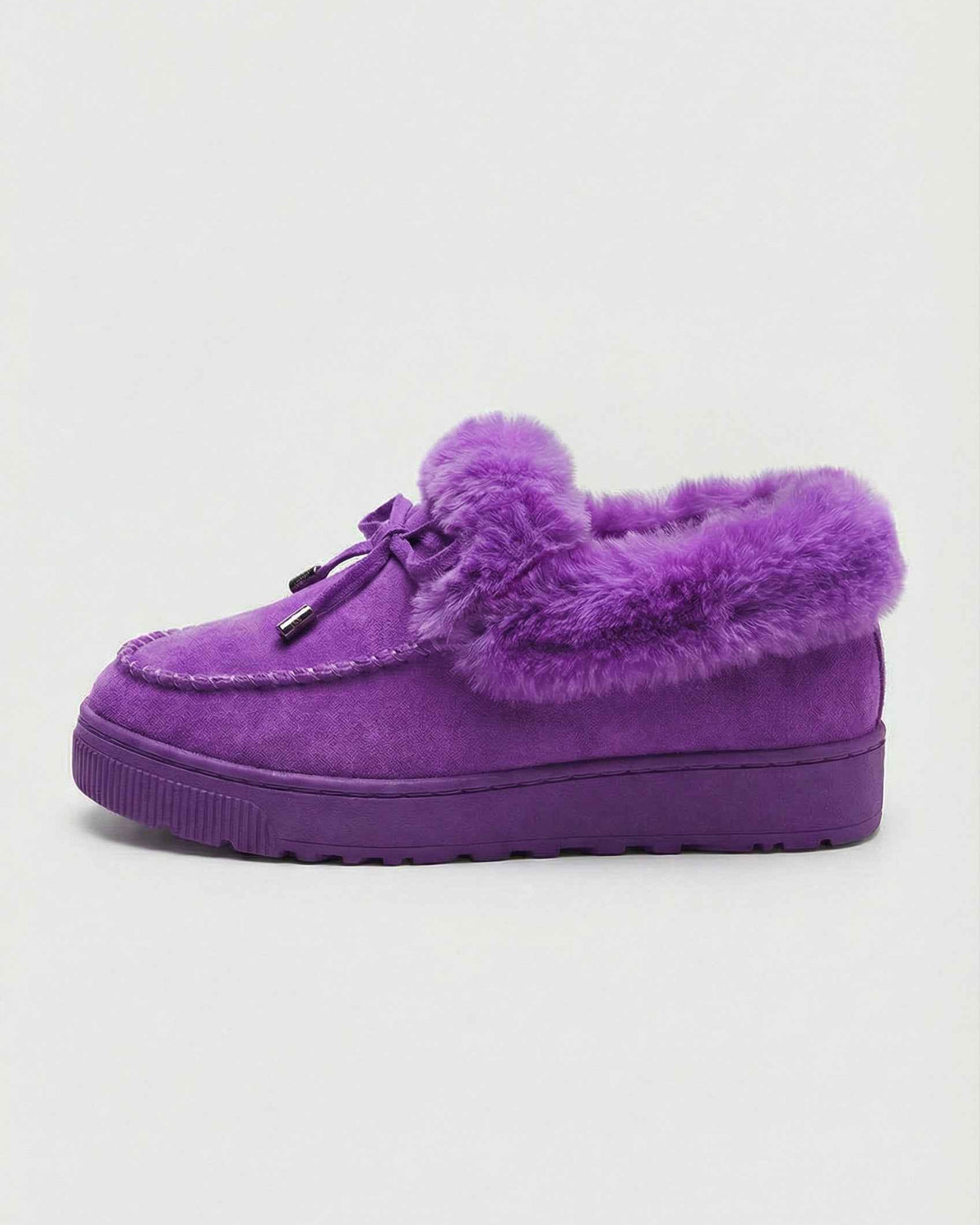 Lumina Wear Victoria purple winter boots with stylish design and comfortable fit, featuring a cozy winter-ready look.