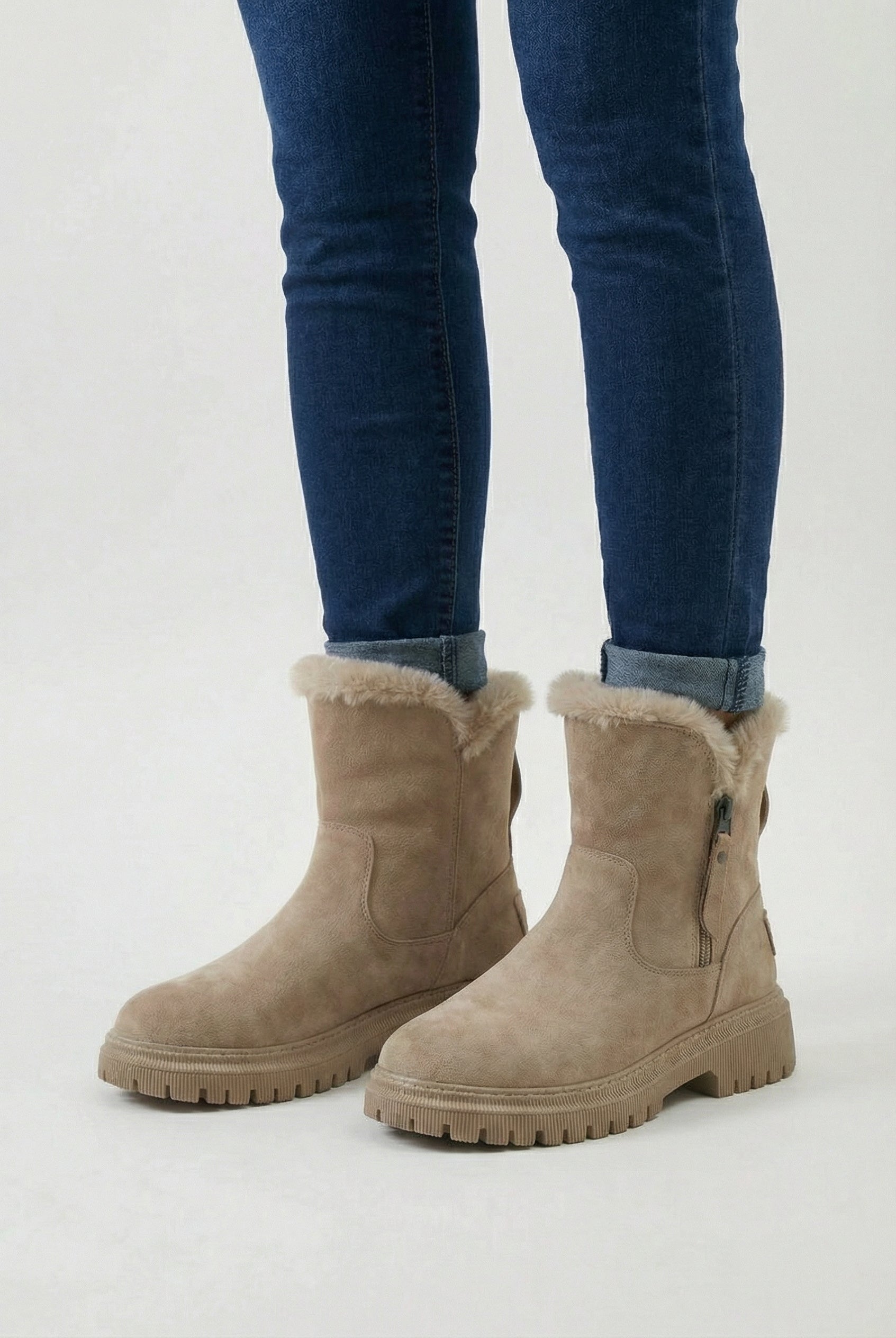 Brown Lumina Wear Victoria waterproof winter boots with a comfortable fit, featuring stylish design and sturdy soles.