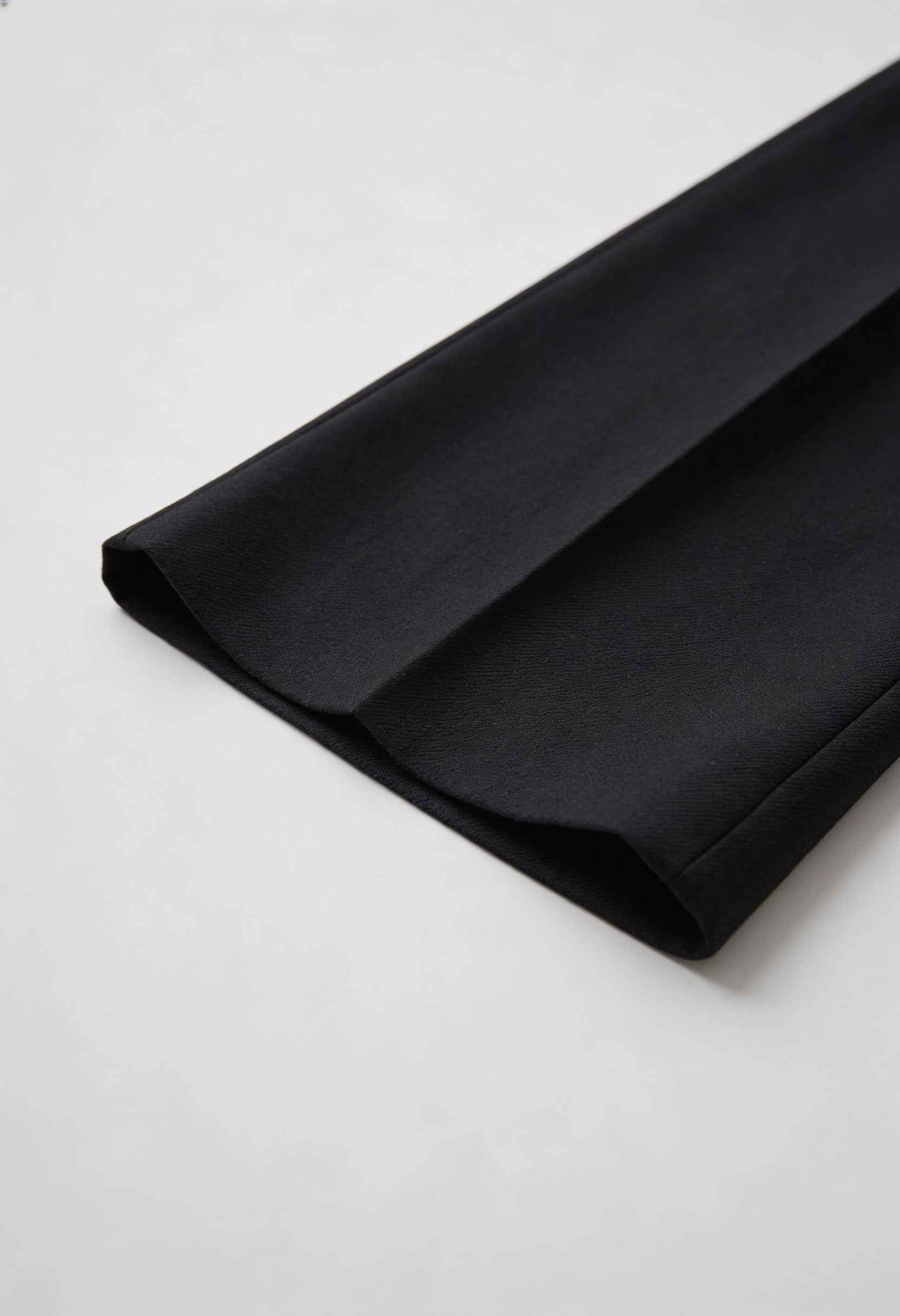 Victoria Lumina high-waisted black women's trousers with tailored fit and comfortable design, shown on a model.