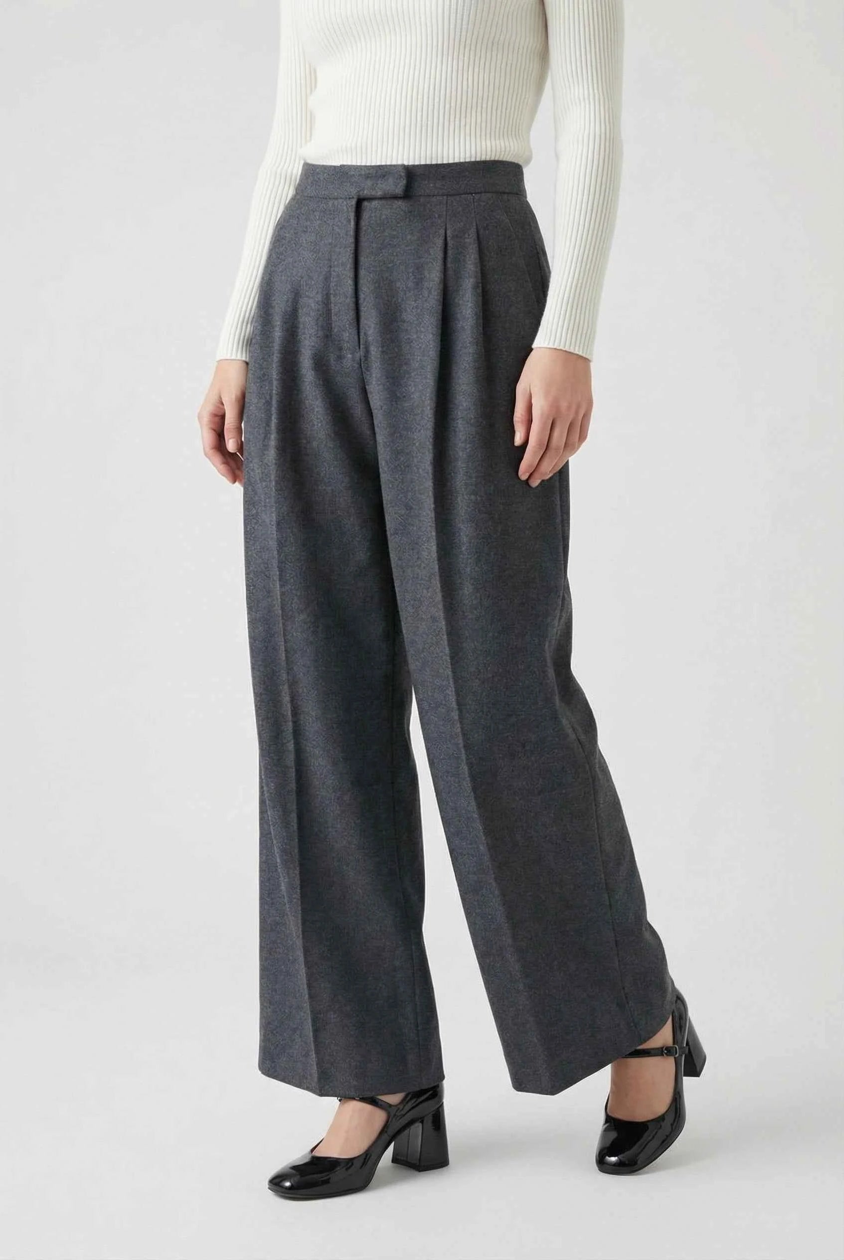 Victoria high-waisted gray trousers by Lumina Wear featuring tailored fit and elegant draping, shown on a model.