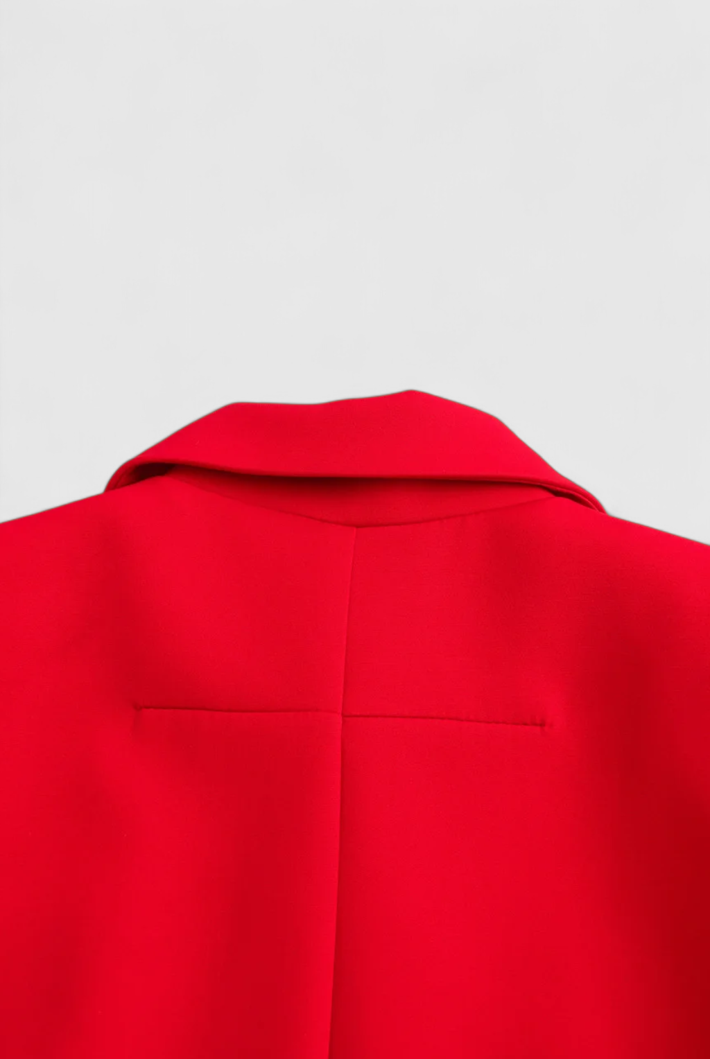 Red women's cropped button jacket by Lumina Wear, Victoria style, featuring a trendy silhouette and flattering fit.