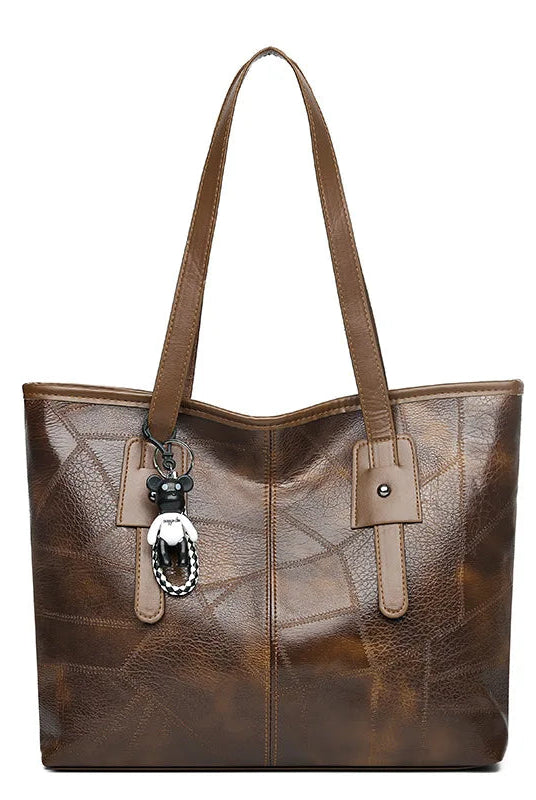 Lumina Wear Victoria vintage-inspired spacious tote bag in khaki with keychain accent, stylish and versatile for everyday use.